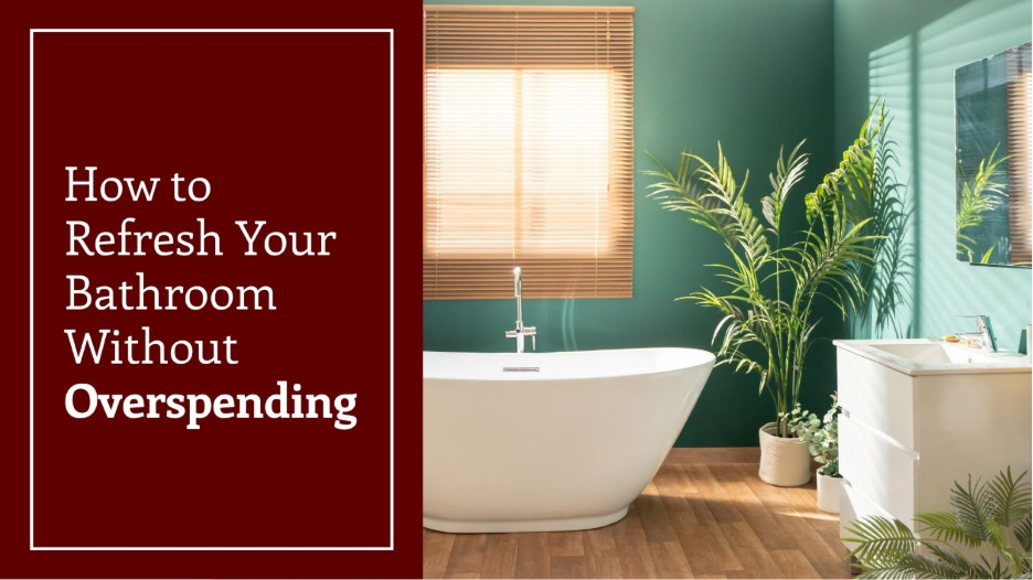 Modern bathroom with a freestanding white bathtub, green walls, wood flooring, and plants, with text reading “How to Refresh Your Bathroom Without Overspending.”